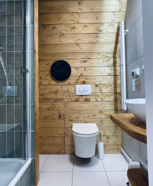 Треугольный дом