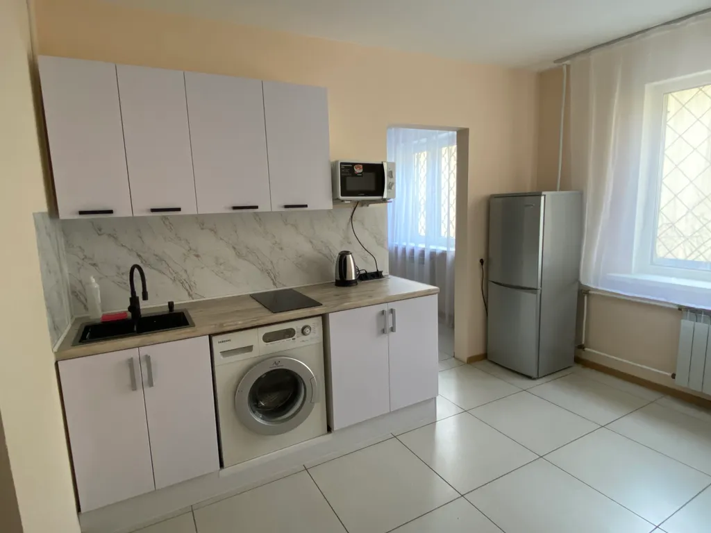 Гостинка с ремонтом в центре города