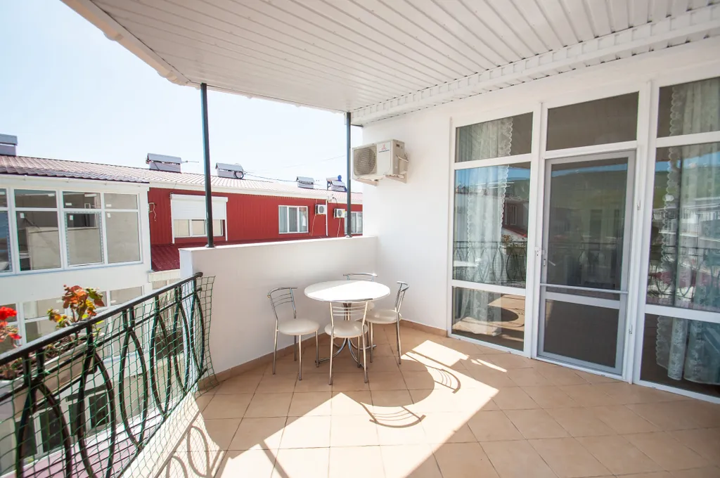 Апартаменты с террасой и боковым видом на море астра 5