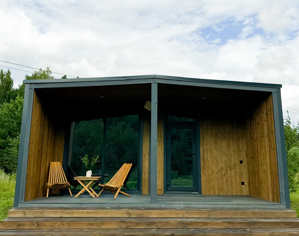 Дом в лесу с сауной в стиле барнхаус
