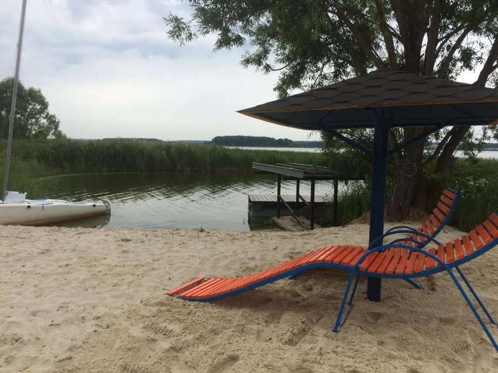 Апартаменты на берегу с камином