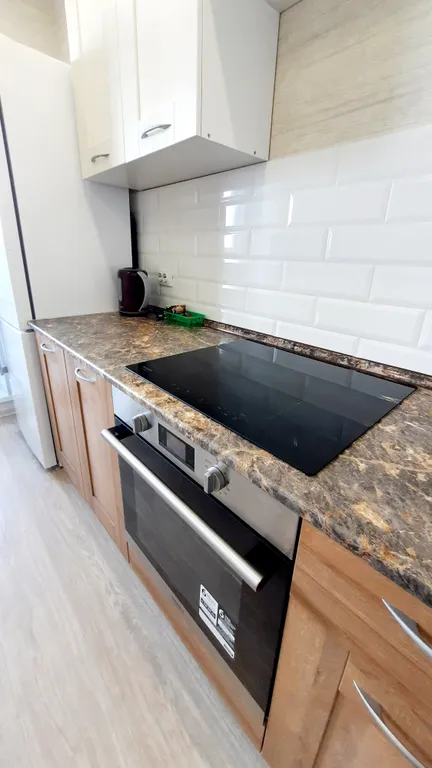 Апартаменты в новом доме в светлых тонах