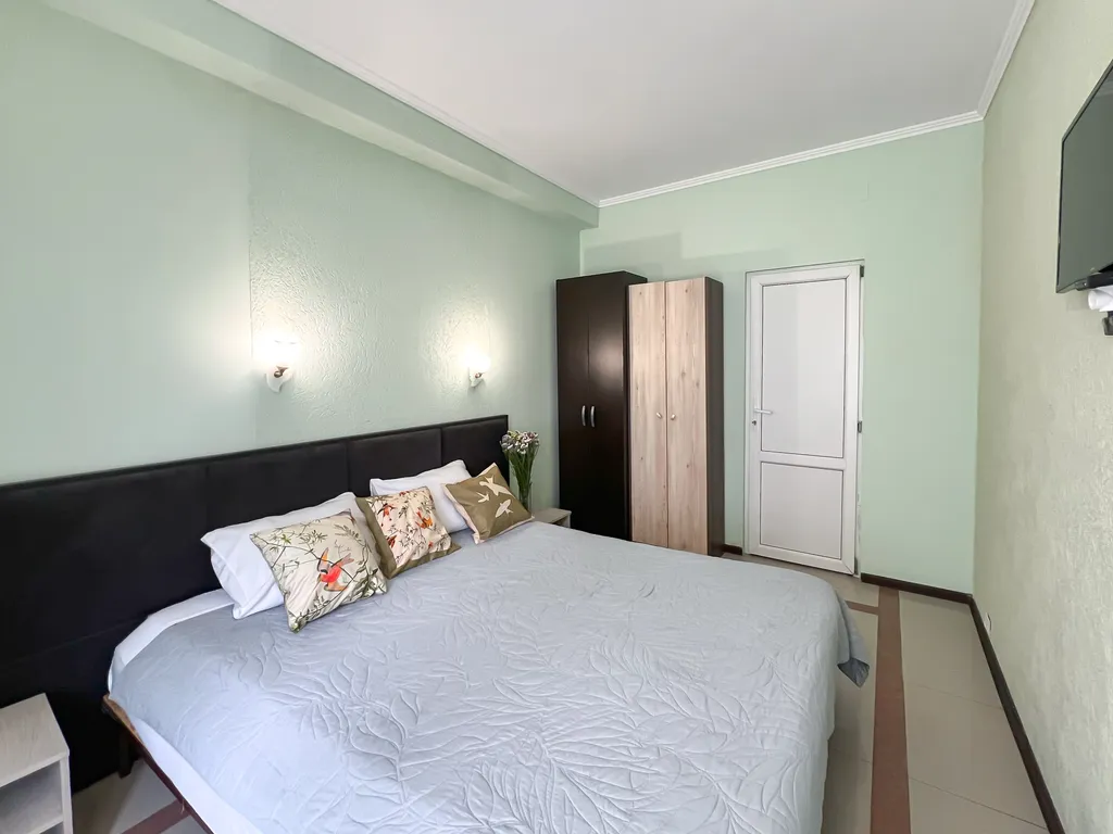 Семейный номер с кухней в центре