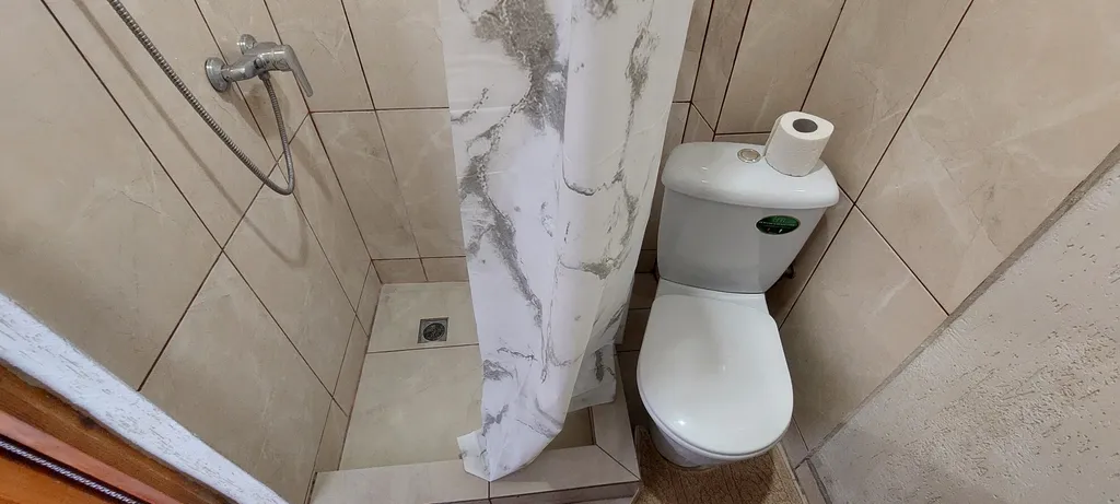 Трёхместный номер с балконом и видом на море