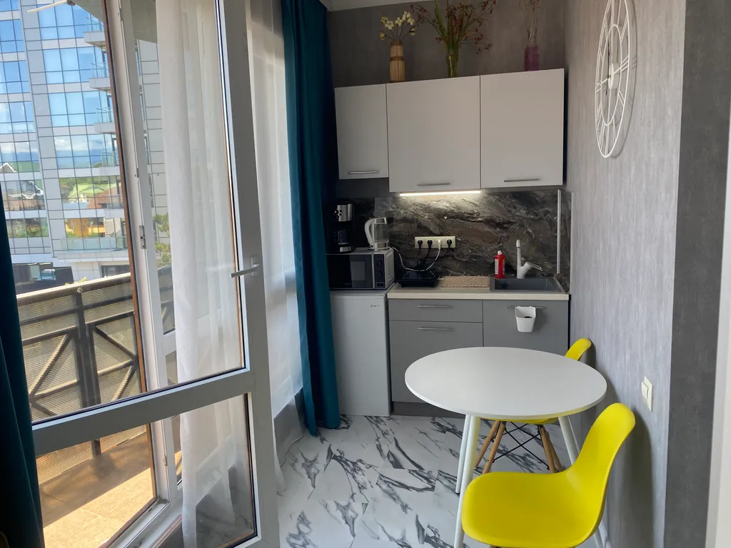 Квартира Квартира Уютная студия в центре Адлера рядом с морем, до Красной поляны 35 мин. — Адлер