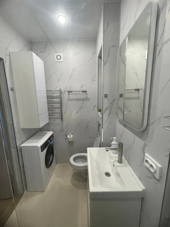 Уютная квартира в тихом районе с развитой инфраструктурой.