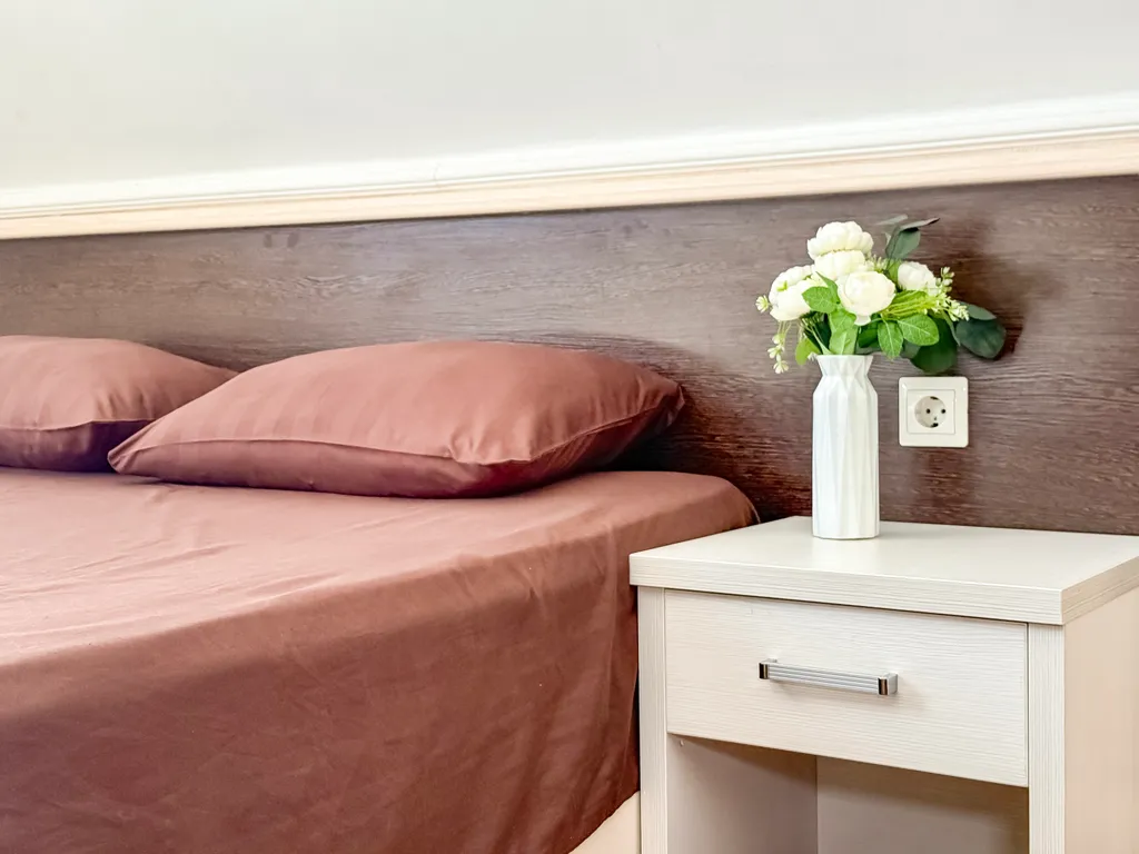 Трехместный мансардный номер в центре, в 7 минутах до моря, с парковкой