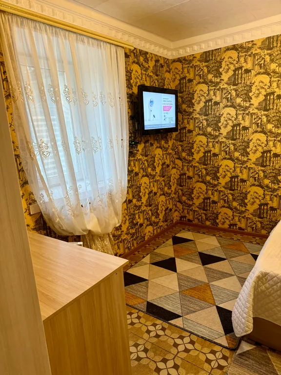 Уютная комната с отдельным входом в центре города, бюджетный вариант