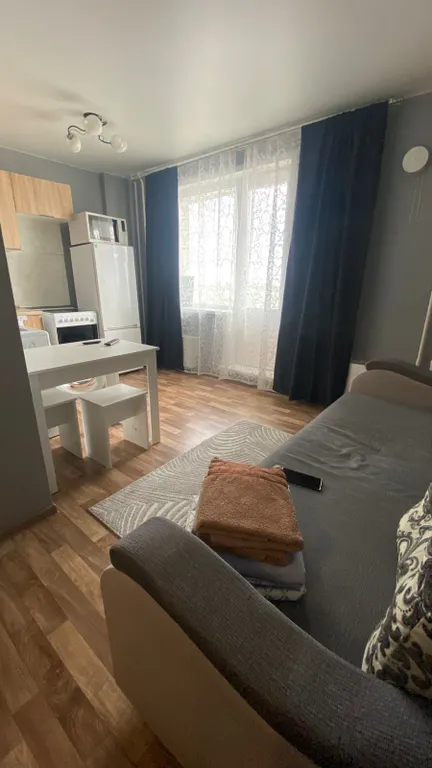 Квартира Уютная квартира студия на высоком этаже — Новосибирск