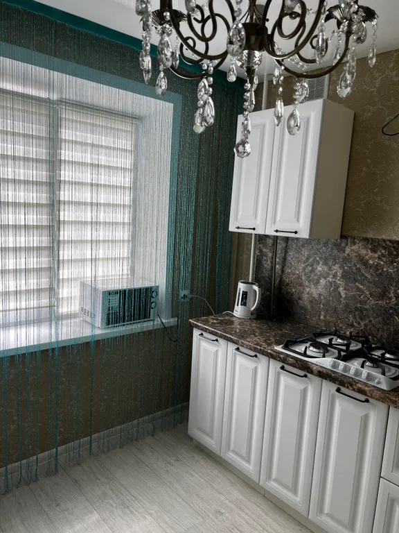 Уютная квартира в центре города, 1 минута до кафе с бизнес-ланчами