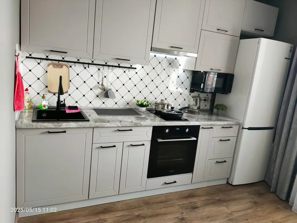 Уютная двухкомнатная квартира с видом на город и реку с 25 этажа