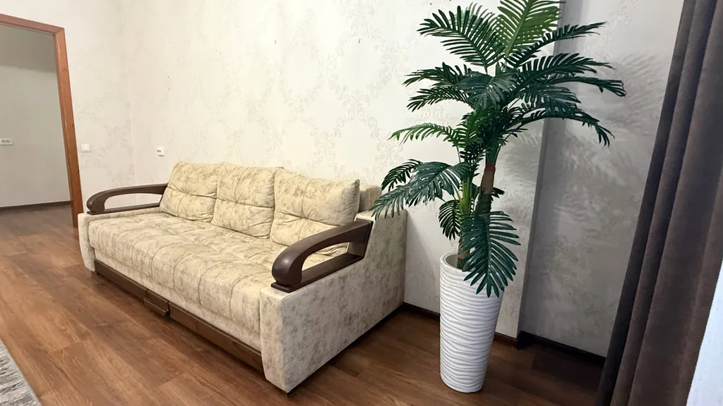 Семейная 2-комнатная квартира с детской кроваткой