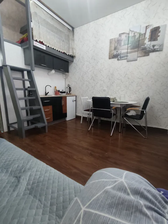 Уютная студия с балконом и видом на море