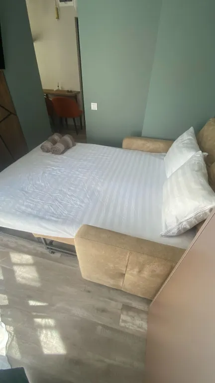 Уютная и стильная студия с отдельной кухней