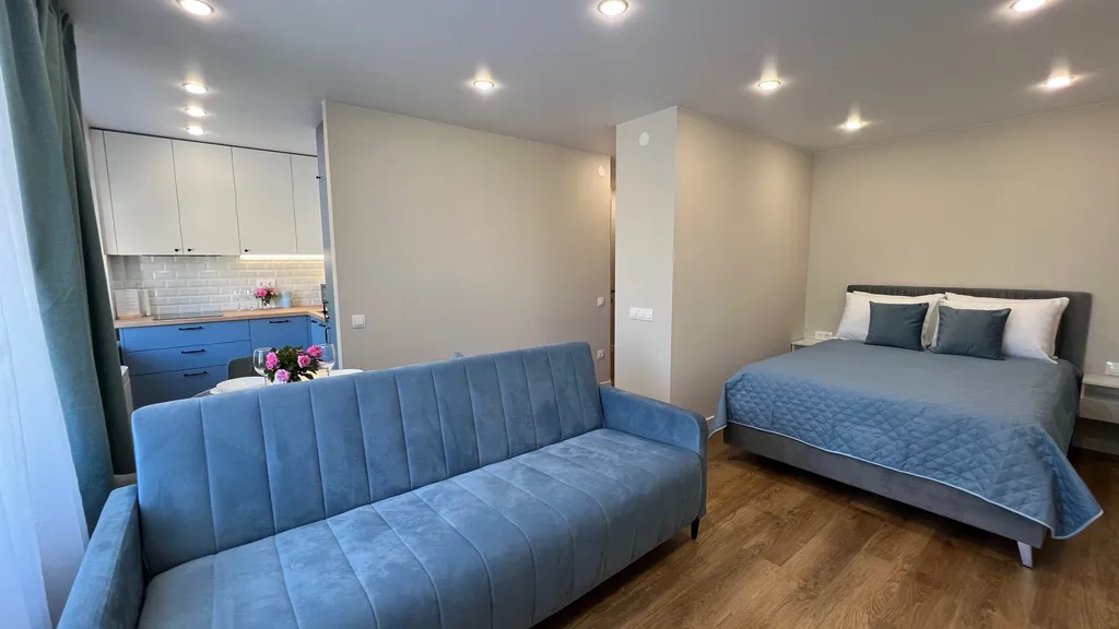 Апартамент у часовой башни и дома гильдии