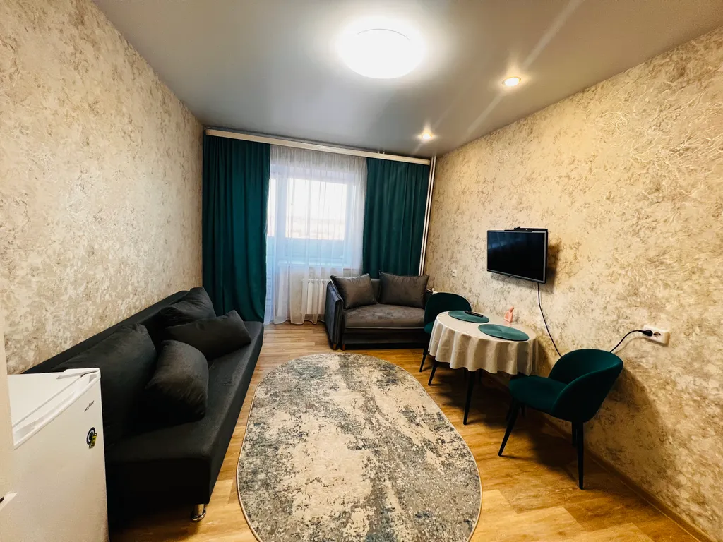 Квартира Уютная студия в центре — аренда посуточно в Искитим