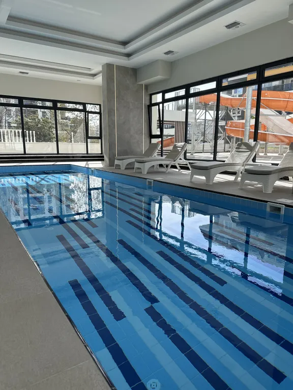 Светлая уютная квартира в Махмутларе с панорамным видом на море и горы