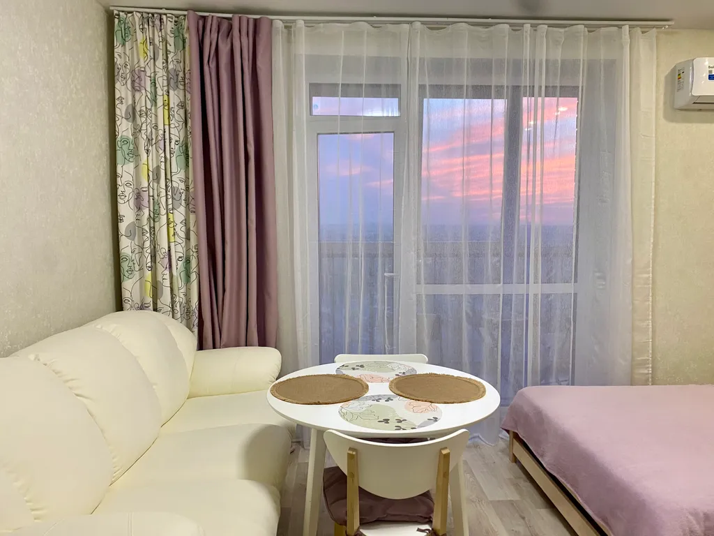 Уютная студия с видом на город