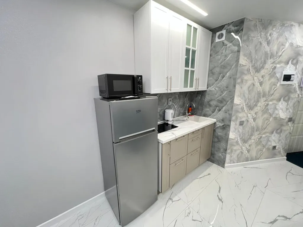 Прекрасная студия с видом на реку и город