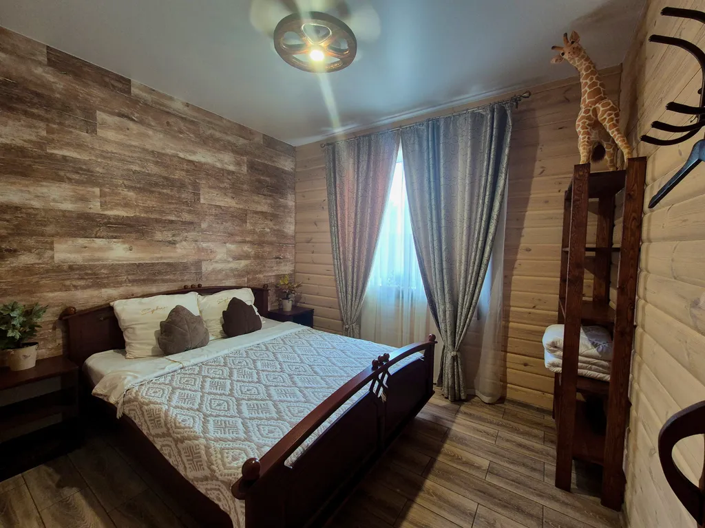 Чудесный дом с сауной и горячей купелью на побережье водохранилища