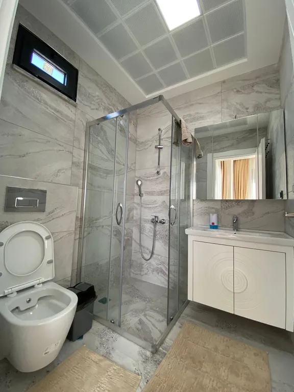 Отличные новые апартаменты 2+1 в центре Махмутлара в Алании