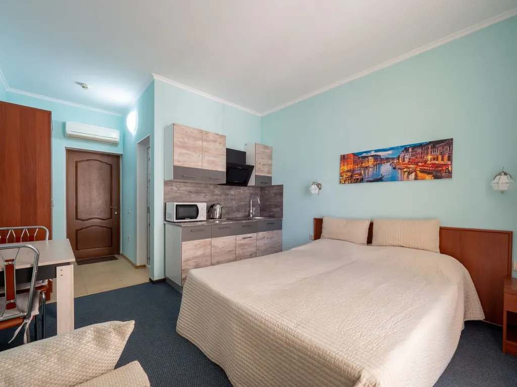 Квартира Квартира Уютная студия у моря с теплым бассейном — Сириус