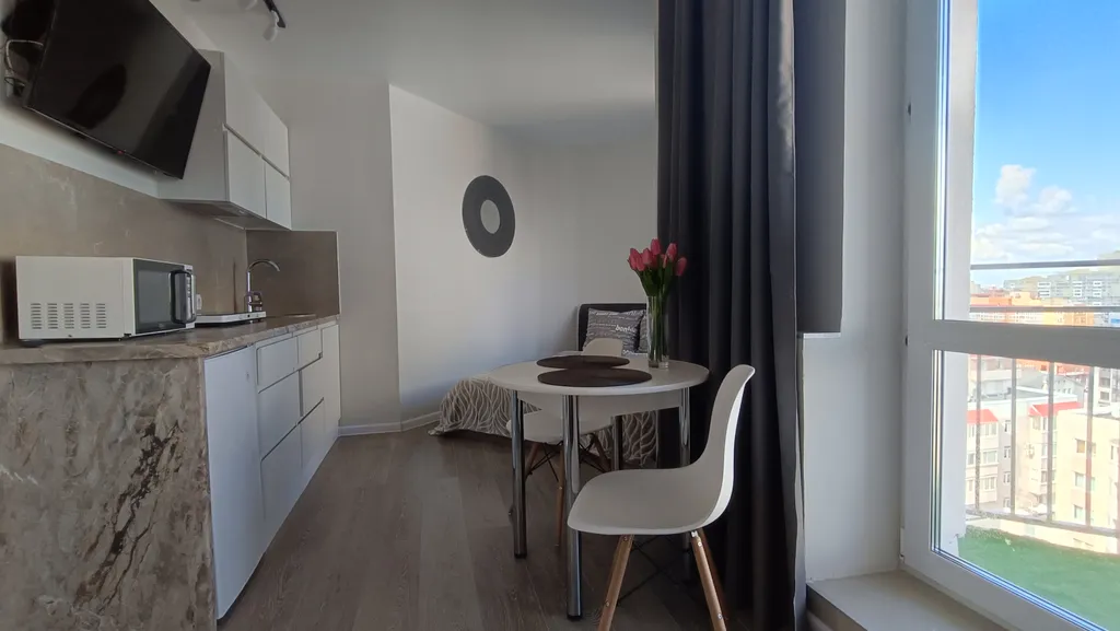 Новая уютная студия на 13 этаже в самом сердце города