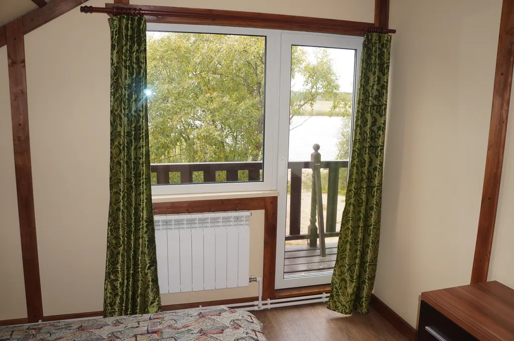 Коттедж Уютный коттедж на берегу Судаковского озера — Ларионово