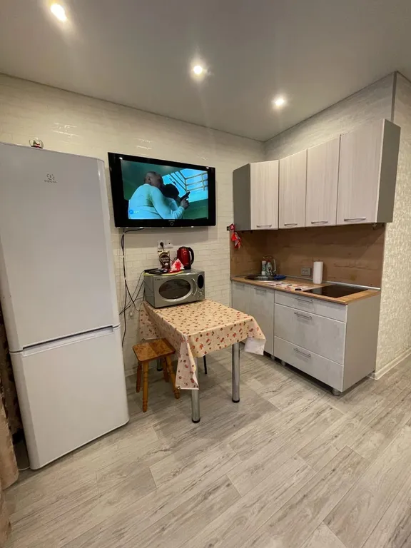 Уютная квартира студия в новом доме в центре города