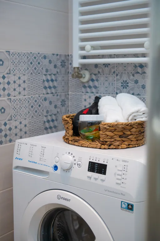 Уютные апартаменты с видом на колесо обозрения и город