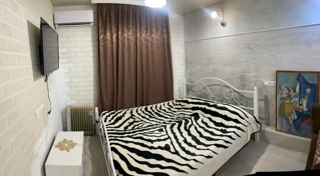 Отдельный домик студия в стиле лофт , со своей кухней и санузлом