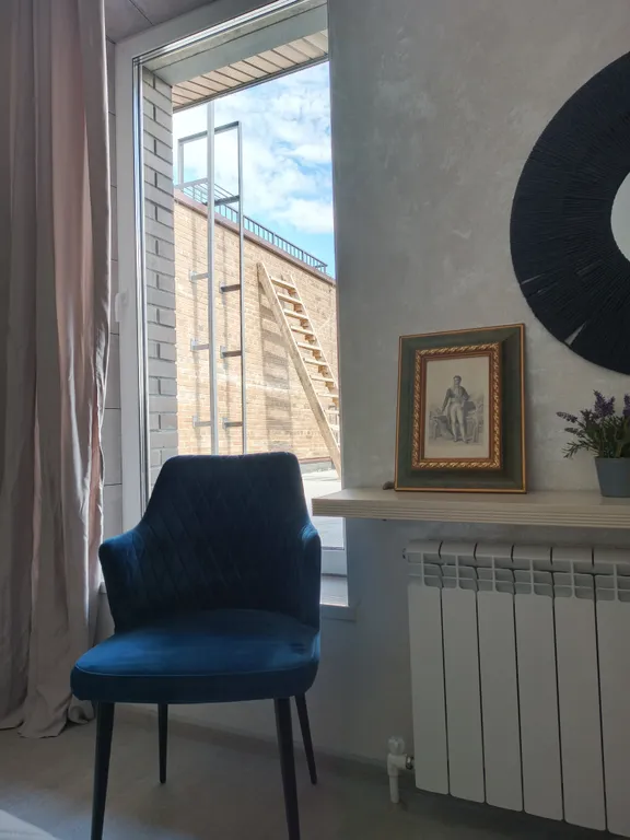 Атмосферная двухуровневая квартира с видом на Петропавловский парк