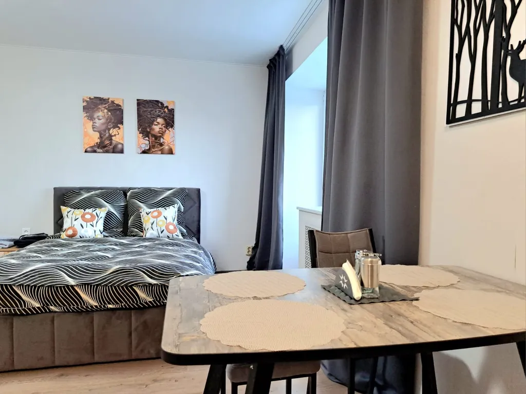 Уютная студия в центре с балконом