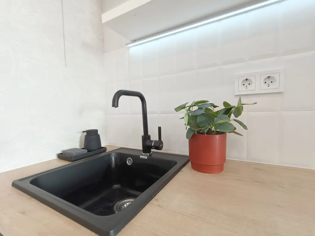 Комфортабельная студия в центре города в доме премиум -класса