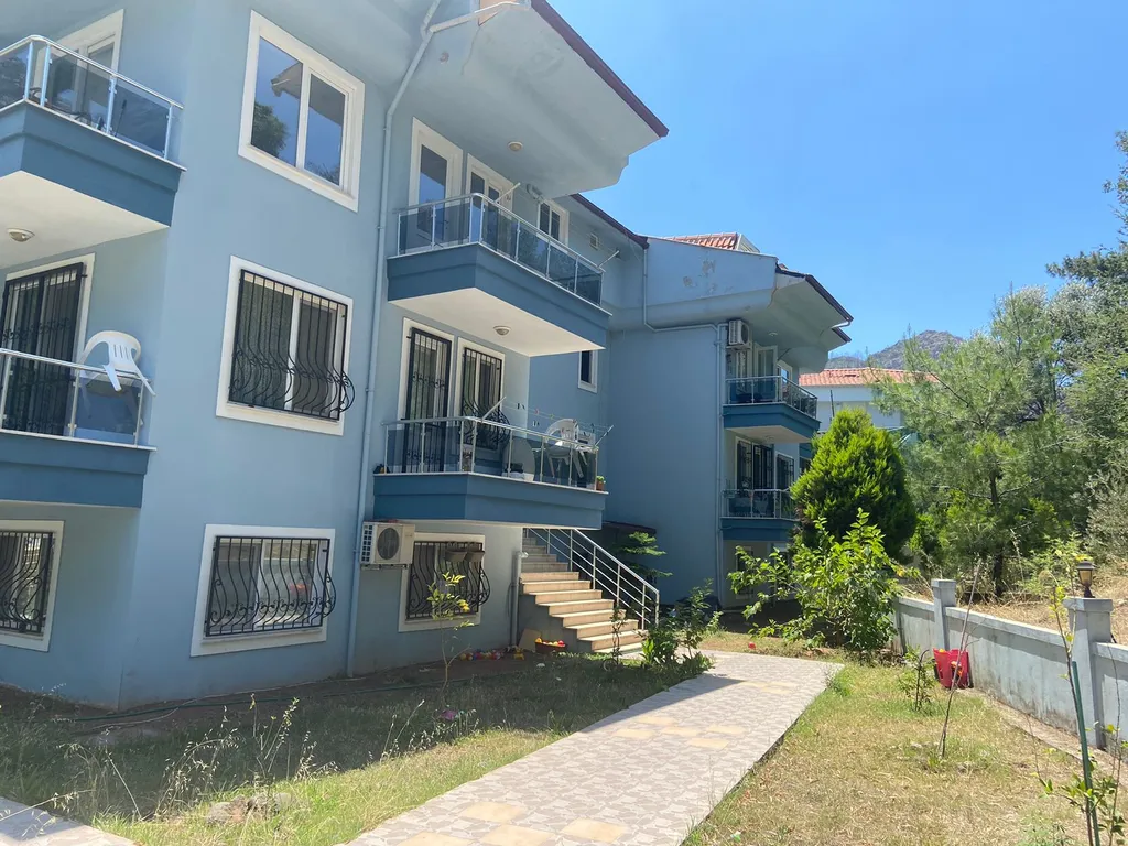 Апартамент с бассейном во дворе в райском уголке Ичмелера