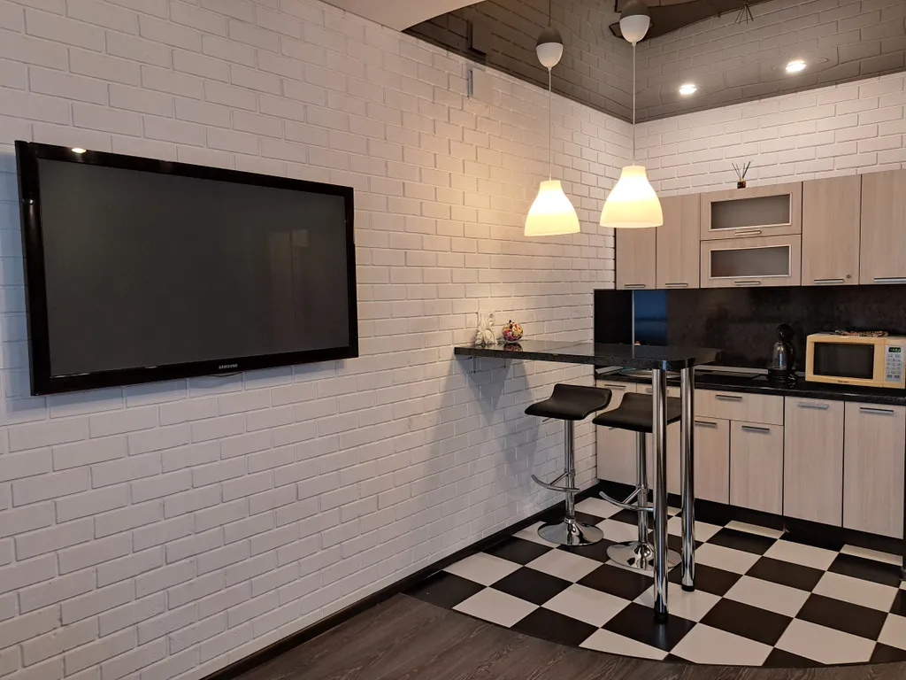 Студия с кондиционером на 14 этаже с видом на стадион