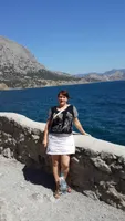 Мила