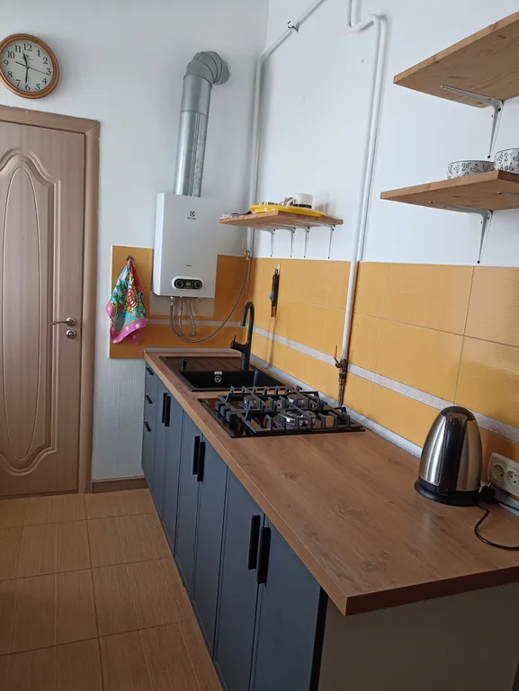 Мансарда в сталинке с арочными окнами