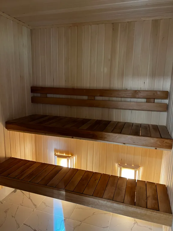 Стильный дом на берегу Ладожского озера с панорамным видом