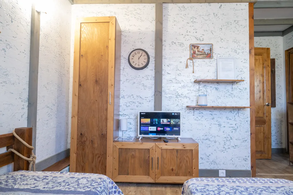 Трёхместный номер с 3 односпальными кроватями