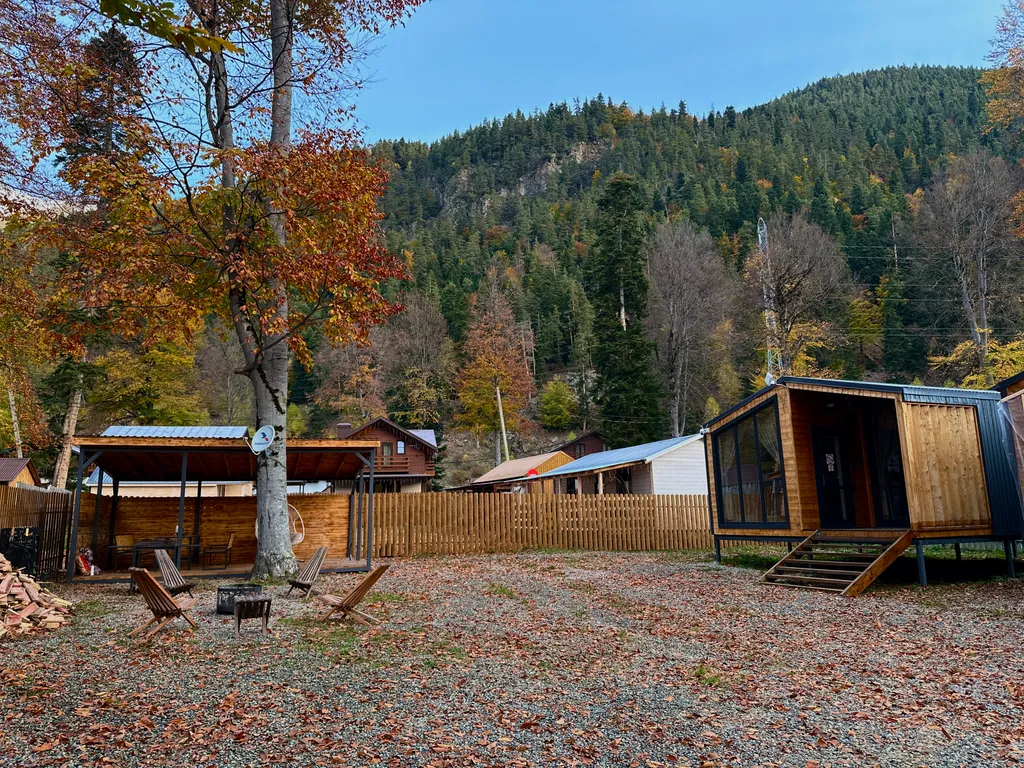 Коттедж Коттедж Уютный барнхаус с большими панорамными окнами — Архыз