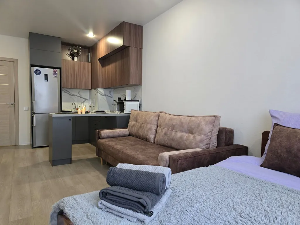 Уютная студия с видом на город