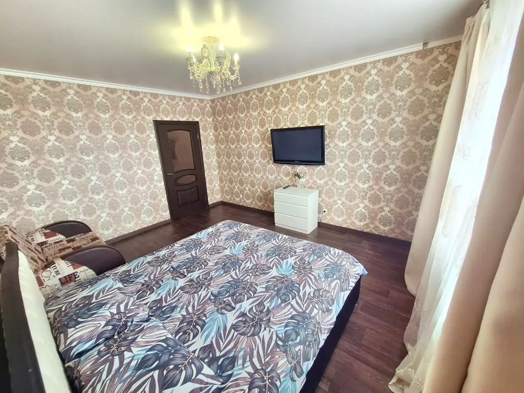 Квартира с двумя балконами на выезде