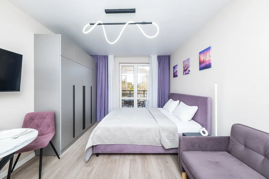 Просторная дизайнерская студия для троих