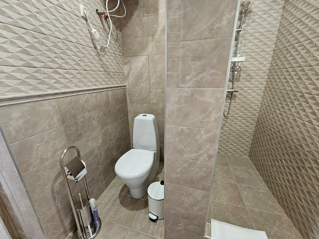 Люкс с балконом и видом на море в отеле Атлас