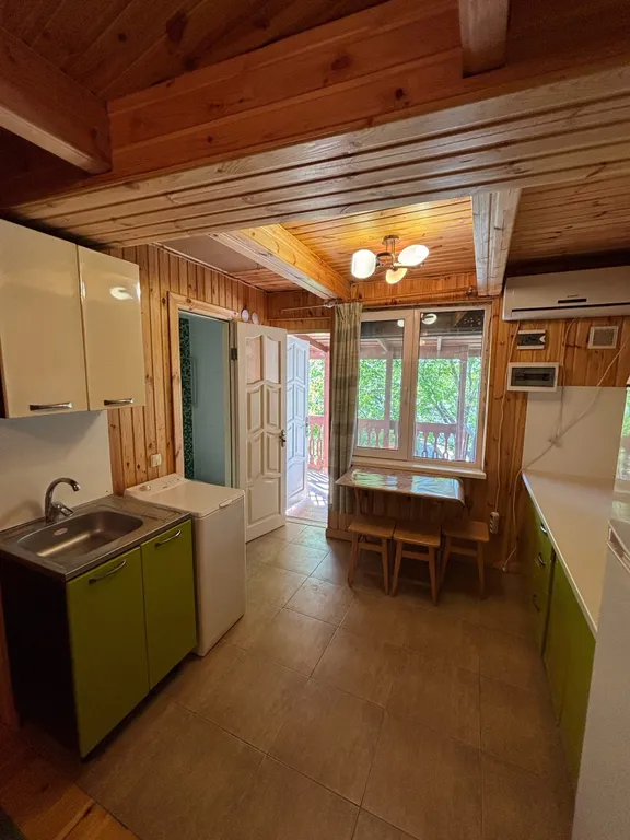 Студия в эко-стиле с кухней и со своей террасой в 200 метрах от моря