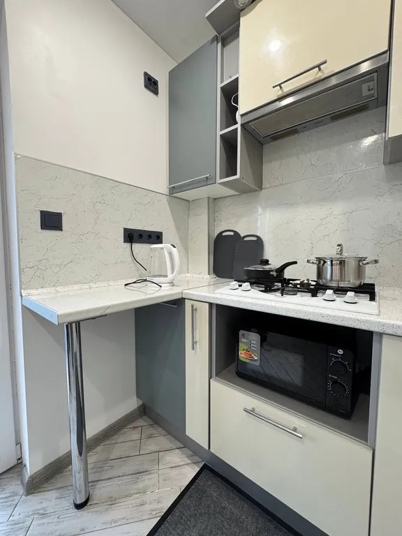 Уютная квартира с панорамными окнами и шикарным видом на город