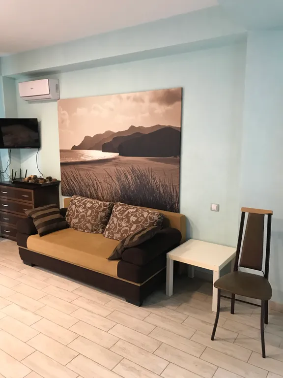 Панорамная студия с потрясающим видом на горы в центре красной поляны