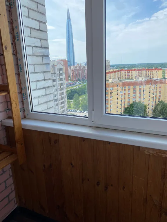 Уютная квартира около Лахта-центра с детской кроватью