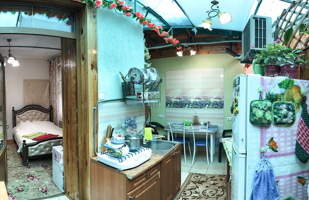 Уютная квартира с летней верандой-кухней